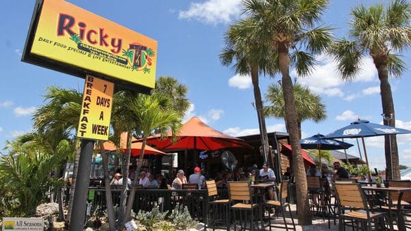 An exterior shot of Ricky T's Bar & Grille on a sunny day