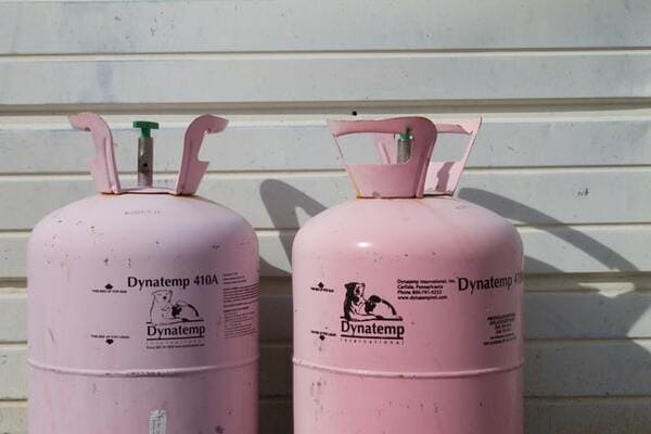 two pink propane tanks