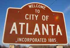 An old sign with the text Welcome to the City of Atlanta